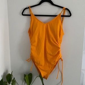 bright yellow one-piece swim suit